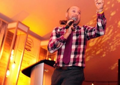 Ryan E. Watson auctioneer for Harvesting Hope campaign